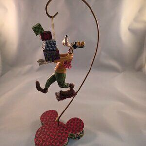 Disney Goofy with presents and stand